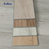 Revêtement de sol en vinyle SPC étanche de haute qualité pierre composite en plastique noyau rigide planche à cliquer nouveau matériau pour une utilisation en salle de sport