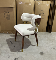 Chaise de salle à manger simple nordique Chaise de café de négociation de luxe légère Chaise de réception de dressing incurvée en tissu moderne