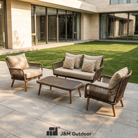 Ensemble de conversation J&M Outdoor Tropical Design 4 pièces en rotin tressé à la main avec structure en aluminium et table basse pour villa et parc