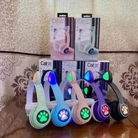 Precio al por mayor, bonitos auriculares inalámbricos con garra de gato, orejas de gato luminosos con auriculares inalámbricos, auriculares estéreo sencillos y bonitos