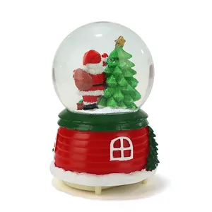 2023 Hot Sales Weihnachten Schneekugel Custom ized Wasserball mit Musik Desktop-Ornamente Home Decoration Statue