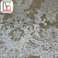 Haute qualité cordon de mariée broderie Sequin Tulle dentelle tissu lourd blanc paillettes brodé maille dentelle tissu pour robe de mariée