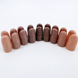 Fundas negras para los pulgares, y fundas marrones y color café para los dedos, diseñadas para accesorios de magia de cerca KingMagic, para todos los tonos de piel. - Product Image 1