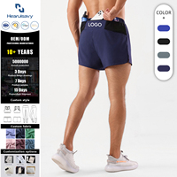 Shorts de sport imprimés pour hommes, décontractés, taille élastique, mi-longs, respirants, séchage rapide, anti-UV, pour la gym et le basketball