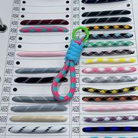 Porte-clés en macramé tressé en nylon fait main pour femmes - Breloques de sac en corde style bohème, plusieurs couleurs pour décorations de sacs à main