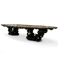 Table à manger élégante et luxueuse en aluminium coulé plaqué or avec une structure unique pour la maison et l'hôtellerie
