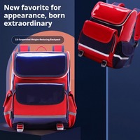 Sac à dos scolaire ergonomique breveté de 16 pouces compartiment géométrique étanche pour ordinateur portable système de soutien de la colonne vertébrale pour étudiants