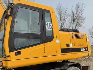 Excavatrice sur pneus Hyundai 210W d'occasion de haute qualité, 21 tonnes, avec attache rapide, brise-roche et tarière, certifiée CE, Daewoo - Product Image 6