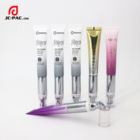 Tube en plastique noir avec tube de baume à lèvres estampage à chaud de 15ml avec applicateur en céramique pour emballage de tube de massage de crème pour les yeux