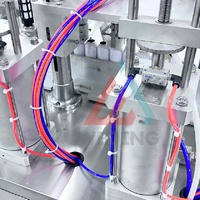 Machine de remplissage pneumatique semi-automatique 4-en-1 à prix d'usine pour bouteilles d'huile, de peinture et de cosmétiques