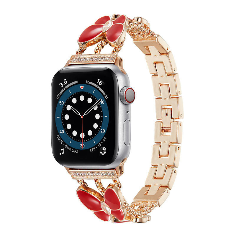 Oro rosa con mariposa roja