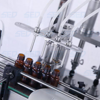 Machine de remplissage de liquide en bouteille rotative entièrement automatique