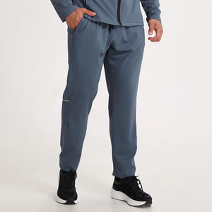<span class=keywords><strong>Pantalones</strong></span> Deportivos al por Mayor para <span class=keywords><strong>Hombre</strong></span>, 90% Poliéster, 10% Elastano, Cuatro Colores Sólidos, Diseño <span class=keywords><strong>de</strong></span> Pierna Recta <span class=keywords><strong>con</strong></span> Franja Reflectante - Product Image 1