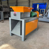 Déchiqueteuse de vêtements textiles usagés, déchiqueteuse de plastique, de ferraille, d'acier, de pneus usagés, de coques de noix de coco, machine à broyer les bouteilles en plastique