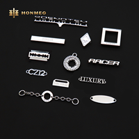 HONMEO Fabricant d'étiquettes métalliques en alliage de zinc gravées sur mesure, étiquettes de vêtements, étiquettes métalliques en gros pour vêtements