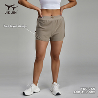 Vente en gros de shorts de gymnastique JIEJIN pour femmes 2 en 1 double pour la course à pied et le fitness avec compression