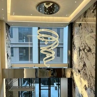 Luminaire suspendu professionnel personnalisé en cristal K9 en forme de double spirale LED pour escalier duplex, villa, salon