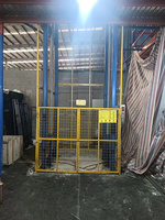 Ascenseur de fret hydraulique électrique avec capacité de 1 tonne et télécommande électrique pour le chargement des marchandises dans les sous-sols et entrepôts