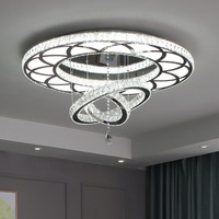 Lustre créatif en forme de cercle en acier inoxydable avec LED, design moderne de luxe en cristal K9 transparent avec télécommande pour hôtel