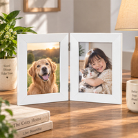Cadre photo pliable vertical à double ouverture noir mat compact avec façade transparente, support de table autoportant pour la décoration de bureau