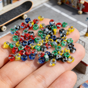 Mini Patineta de Dedo con Rodamientos de Alto Rendimiento, Piezas de Patineta de Cuatro Ruedas de POM Duraderas - Product Image 1