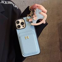 Étui de téléphone DYL pour 17 Pro Max, style streetwear mince, antichoc, avec porte-cartes, motif cheval à bascule, portefeuille mignon en cuir véritable