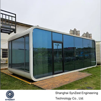 Maison mobile écologique moderne en forme de capsule spatiale, préfabriquée, modulaire, portable, sur roues, entièrement meublée