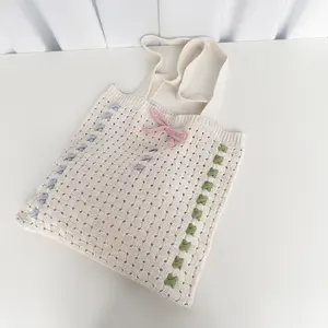 2024 Venta al por mayor de fábrica Nuevo diseño de lazo Estilo de ballet Y2K Bolsos de mano diarios para mujer Bolsos de playa de ganchillo de punto