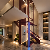 Ascenseur domestique compact à traction pour 2 personnes, idéal pour villas modernes et résidences en duplex
