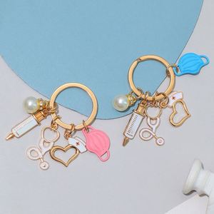 Llavero Creativo de Metal con Colgante de Máscara, Estetoscopio y Jeringa, Regalo Conmemorativo para Personal Médico y Enfermeras - Product Image 3