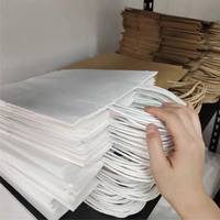 GiGO Vente en gros emballage de cadeau artisanal de luxe personnalisé brun blanc sacs en papier kraft imprimés matériaux recyclés avec votre propre logo