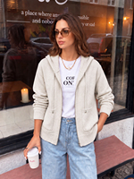 Cardigan zippé à capuche en maille unie respirante 100 % polyester pour femme, à manches longues, avec poches plaquées, style décontracté et sportif