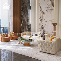 Ensemble de meubles de luxe pour salon de villa haut de gamme moderne, canapé en cuir véritable beige chaud à rayures dorées, table basse, table d'appoint