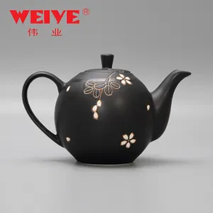 فريد أنيقة الفني أسود السيراميك اليابانية إبريق الشاي مع زهرة نمط