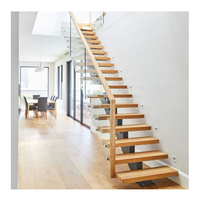 Escalier intérieur durable à monopoutre flottante, design moderne, avec garde-corps en verre, escalier en acier et bois pour appartements, sous-sols, halls