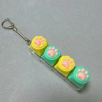 Breloque porte-clés Macaron colorée en forme de patte, bouton de clavier anti-stress, jouet amusant et mignon, breloque de sac, jouet pour les doigts