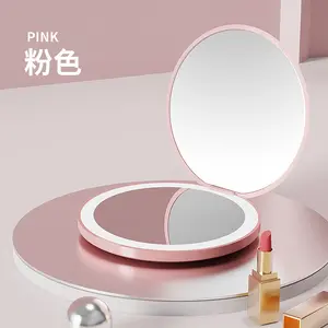 Espejos cosméticos redondos portátiles personalizados al por mayor con luz LED