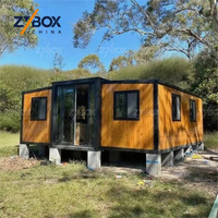 Casa contenedor expandible de madera OEM con entrega en 10 días, casa modular prefabricada, mini casa para unidades vacacionales en Nueva Zelanda y Canadá