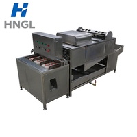 Machine industrielle automatique de décorticage d'œufs durs, conforme aux normes de sécurité alimentaire, en promotion