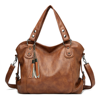 Sac à main bandoulière MELI en cuir PU avec logo personnalisable, nouveau modèle pour femme, forme oreiller, pompon, fermeture éclair, grande capacité, portefeuille