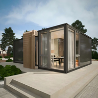 Maison conteneur détachable et empilable Boxspace avec structure en acier galvanisé, design industriel modulaire préfabriqué, aménagement personnalisable