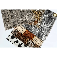 Vente chaude Tissu de canapé en velours personnalisé 100% polyester tricoté à motif animal imprimé tigre pour la tapisserie d'ameublement