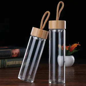 יצרן בקבוקי מים בעיצוב אישי ויפהפה בקבוק מים זכוכית ידידותי לסביבה עם מכסה במבוק וחבל