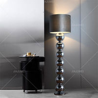 Lampe sur pied LED de style industriel nordique avec base en métal empilée et abat-jour en tissu doux pour maison d'hôtes, café, bureau