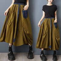 Jupe ballon décontractée plissée asymétrique taille élastique en jean olive patchwork couleur contrastante pour femme, collection été 2026, vente en gros