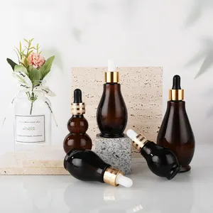 Direct Selling essential oil bottle cosmetic transparent essential spray glass bottles with silicone straw and metal cover