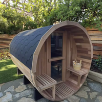 HELIUS Sauna extérieur traditionnel en cèdre rouge/raineté, tuiles de toiture en asphalte noir, murs de 38 mm, sauna en forme de baril à vendre