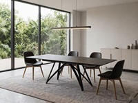 Table à manger rectangulaire extensible en céramique noire, design moderne avec pieds en métal robustes, à vendre