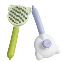 Brosse de massage autonettoyante pour animaux de compagnie, démêlante à un bouton, avec manche incurvé en forme de chat, pour l'élimination des poils de chiens et de chats