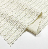 Nuevo diseño 93% poliéster reciclado 7% Spandex 3D Jacquard estiramiento curvo raya tejido de punto para abrigo